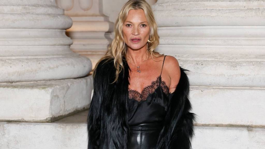 Kate Moss Wears High Slit Skirt for YSL Show