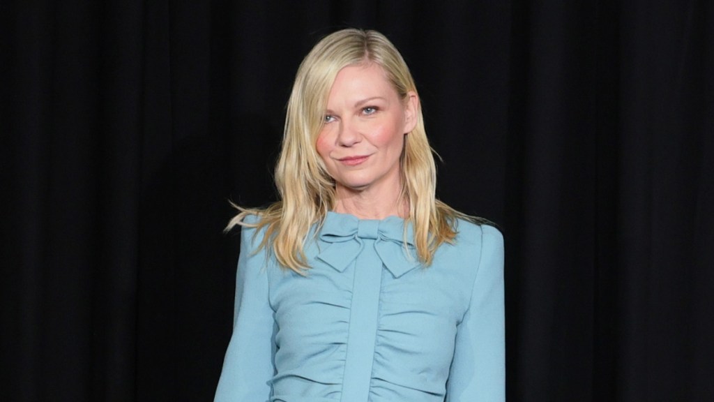 Kirsten Durst Poses in Blue Mini-Dress For PFW