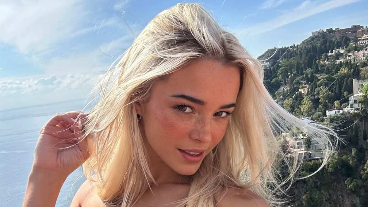 Livvy Dunne’s Bandeau Bikini Top Selfie Shows Her Soaking up the Sun