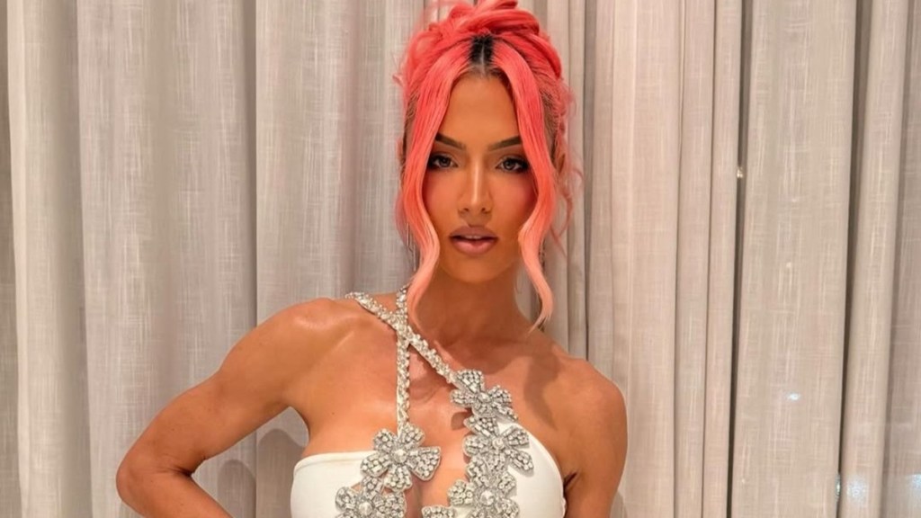 Natalie Eva Marie's Crystal Gown Is Just Held By Threads