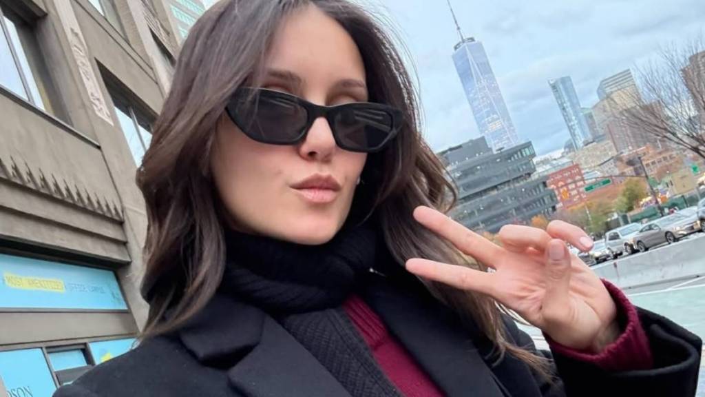 Nina Dobrev’s Black Bikini Highlights Toned Abs on Boat