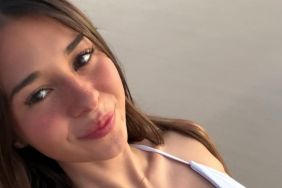 OnlyFans' Sophie Rain Poses in Vibrant Orange Bikini on Beach