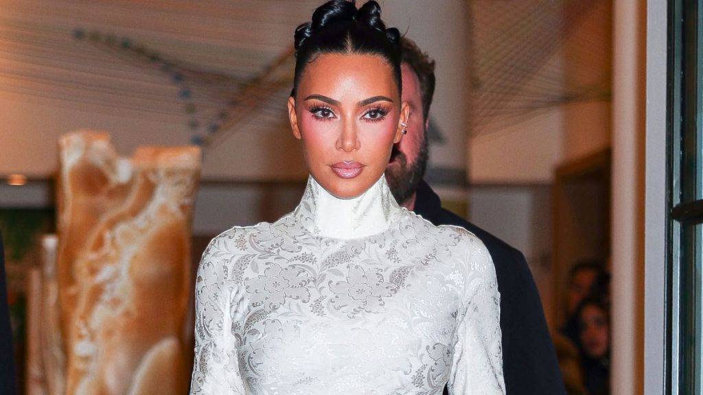 Kim Kardashian Wears Robe Over Lingerie for SKIMS Campaign