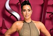 Kim Kardashian Brings the Heat in Mini Shorts & Bold Top for SKIMS