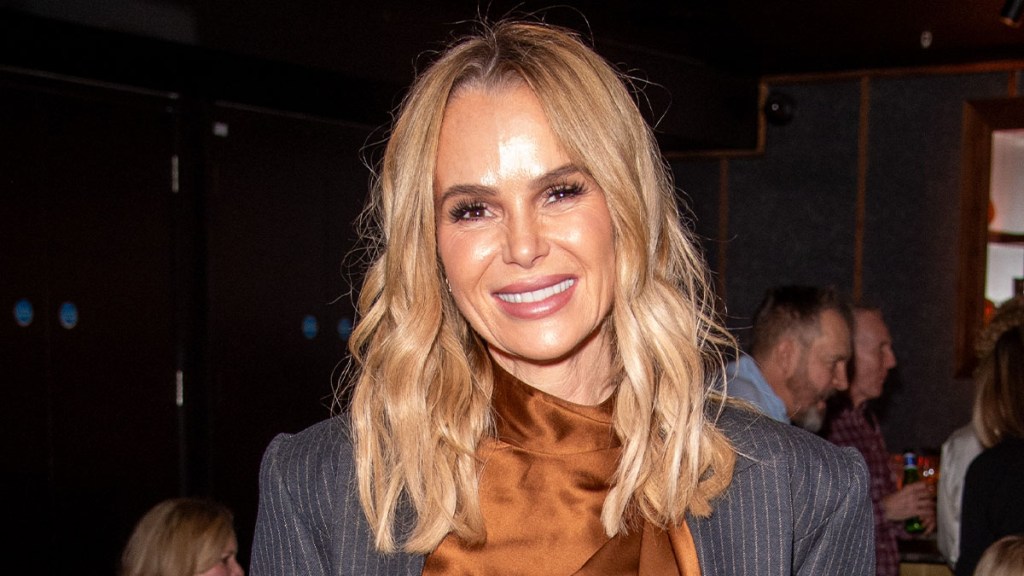 Amanda Holden Turns Up the Heat at Winter Olympics as She Tries on Bobsled Suit