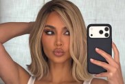 Kim Kardashian Poses in Bold Tank Top Ahead of SKIMS Shoot