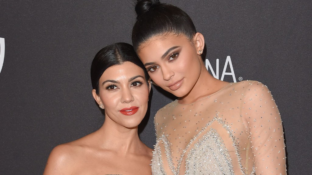 Kourtney Kardashian Kylie Jenner Hold Hands Cosmetic Event