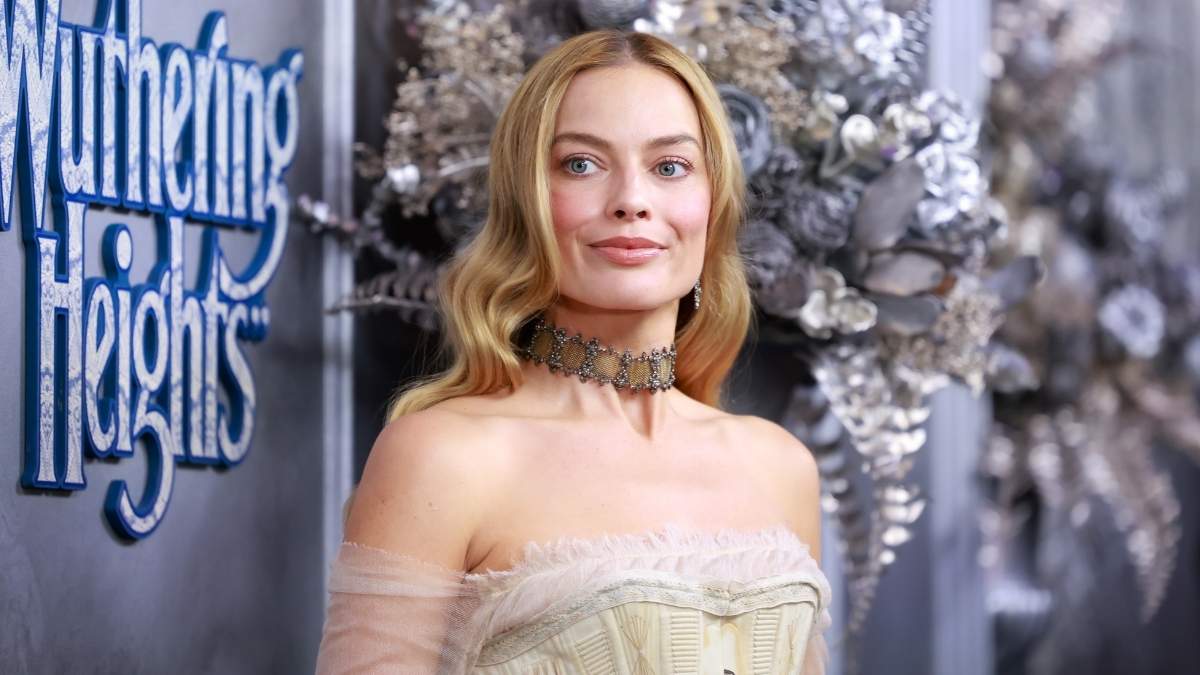 Margot Robbie Pairs Strapless Corset Minidress With Manolo Blahniks