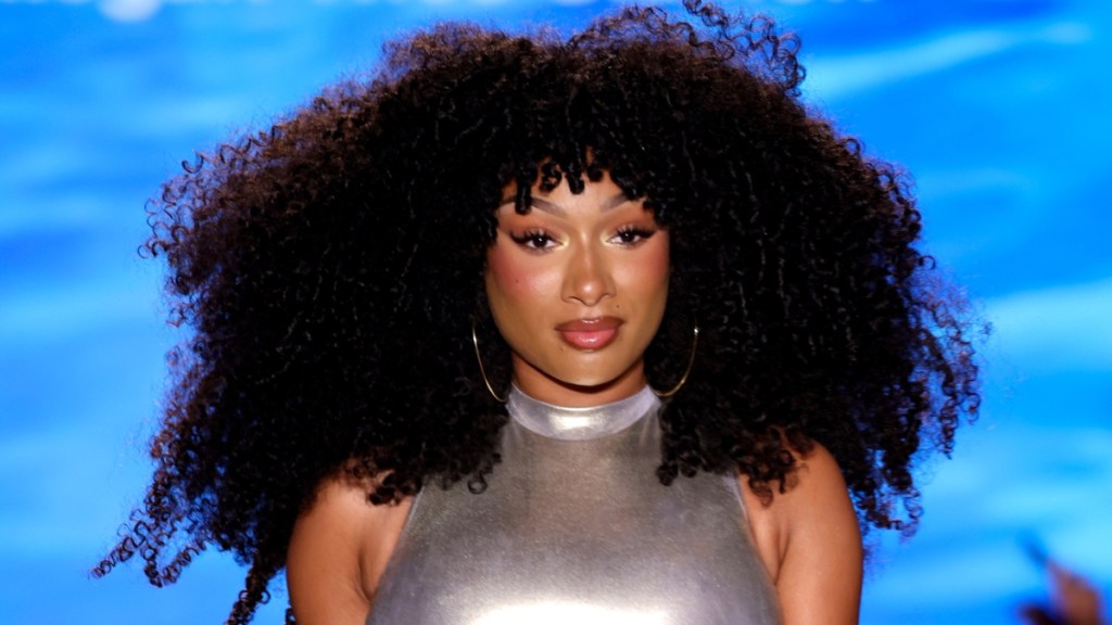 Megan Thee Stallion Turns Heads in Bold String-Tied Slit Skirt Following Winter Olympics