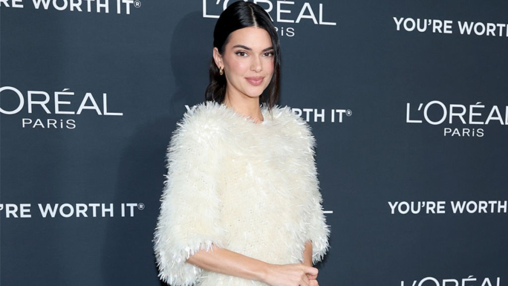 Kendall Jenner’s Fully Sheer Tights Pair up With a Sweater for Vogue France