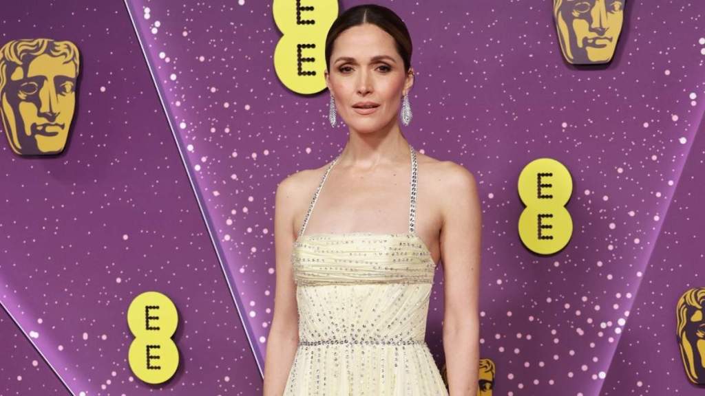 Rose Byrne Stuns at BAFTAs in Miu Miu Dress Held by 2 Thin Straps