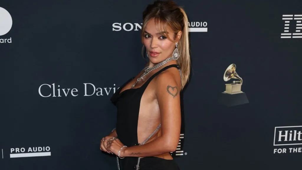 Karol G’s Backless Look Comes With High Slits & Chains for Pre-Grammys