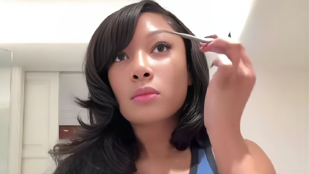 Megan Thee Stallion Applies Makeup in Crop Top in Anime Update Video