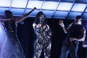 Cardi B Performs for SNL in Sheer Strappy Catsuit