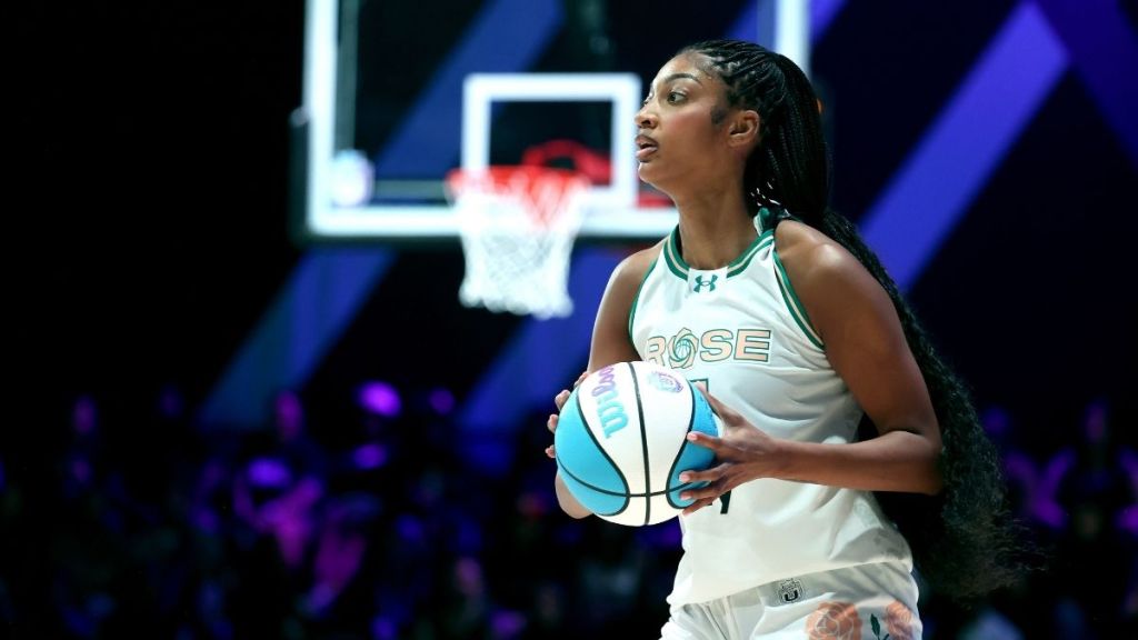 Angel Reese Brings a Bold Skirt & Strappy Crop Top Look to Photo Dump