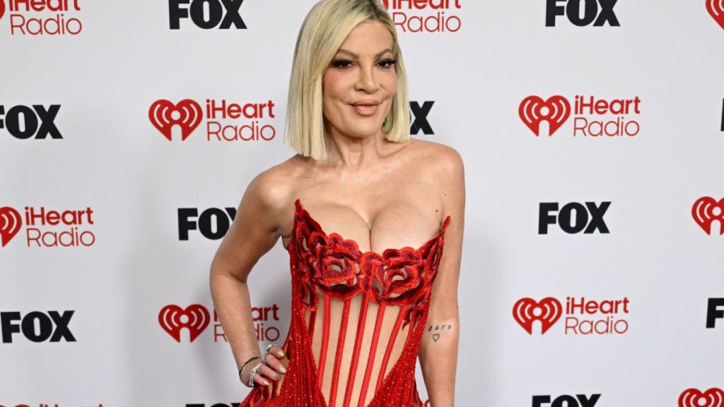 Tori Spelling’s Corset Dress Packs a High-Slit, Sheer Twist at the iHeart Awards 2026