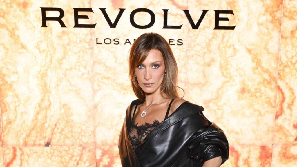 Bella Hadid's Sheer Lace Top Rests on Two Straps for Revolve Event
