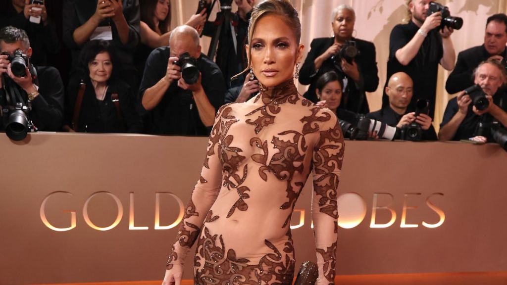 Jennifer Lopez Dances Away in Sparkly Bodysuit & Knee-High Boots
