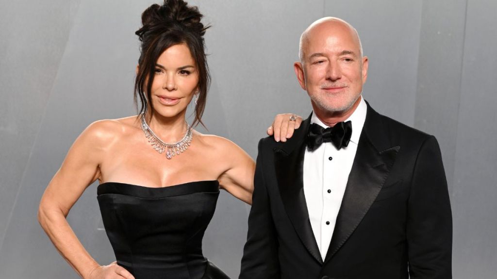 Lauren Sanchez Seems to Shoo Jeff Bezos off Oscars Party Red Carpet