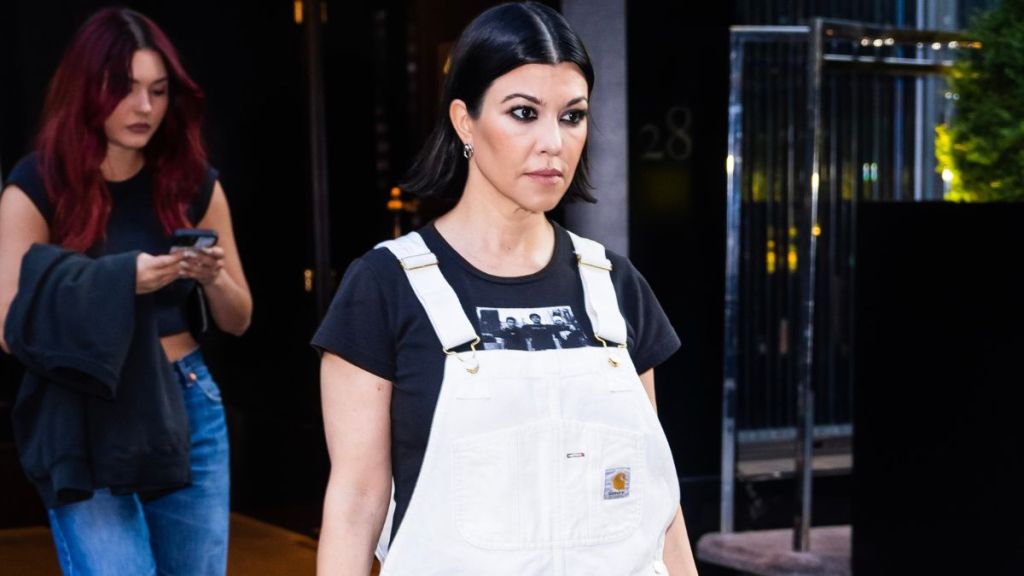 Kourtney Kardashian Spills the Tea in Bed in a Micro Minidress for Lemme