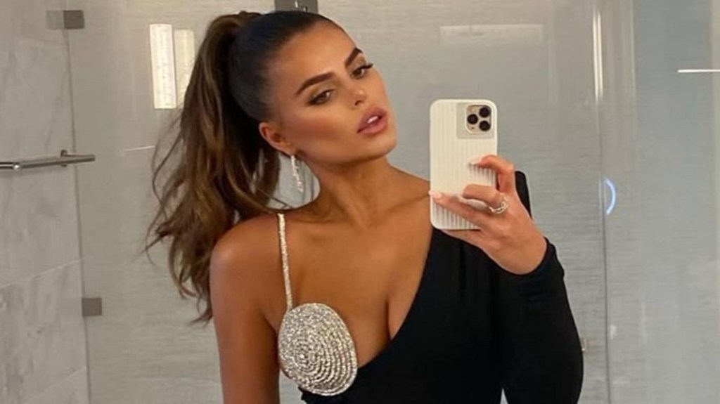 Brooks Nader Poses in Daring String Bikini in New Agua Bendita Video