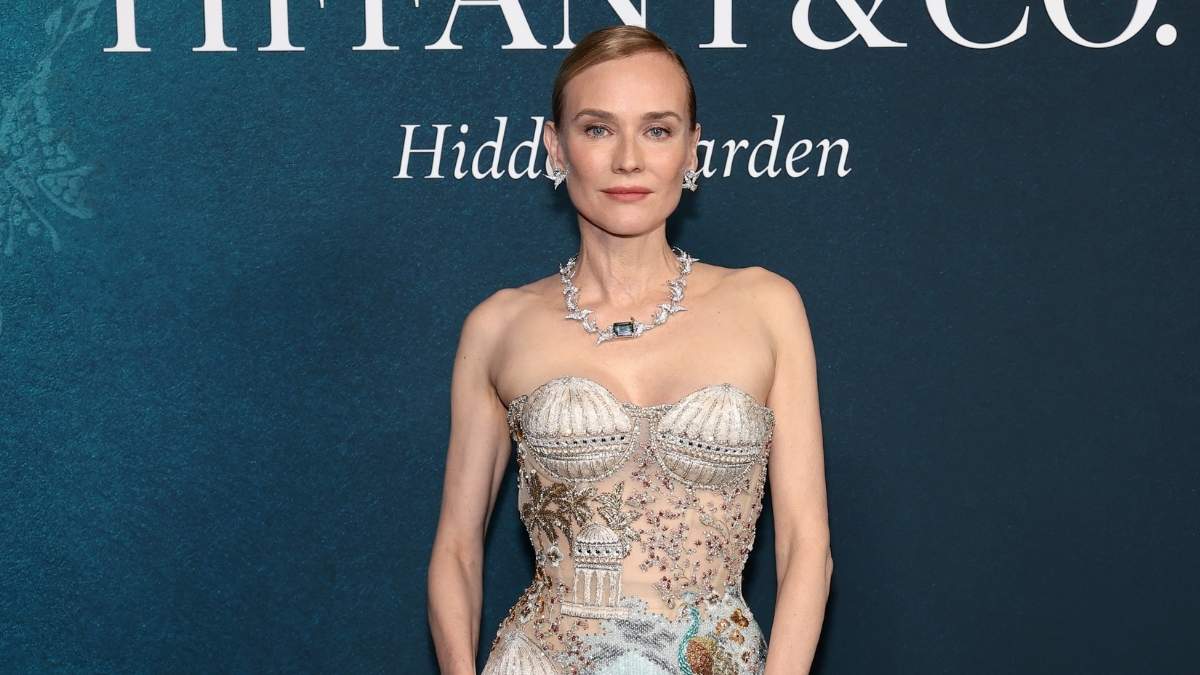 diane kruger blue dress Hourglass pencil dress in navy with faux wrap from The Pretty Dress Company