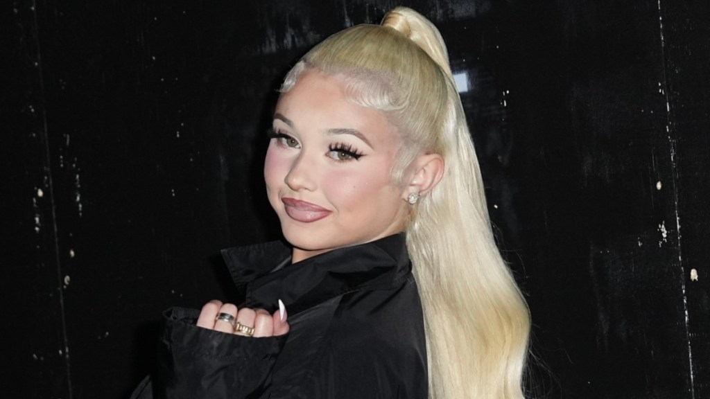 Alabama Barker Commands Attention in Strap-Held Lacy Mini Dress in New Photos