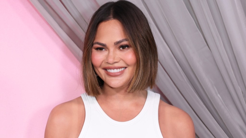 Chrissy Teigen Showcases Skincare Right Out of Shower Amid Fashion Trust Outing