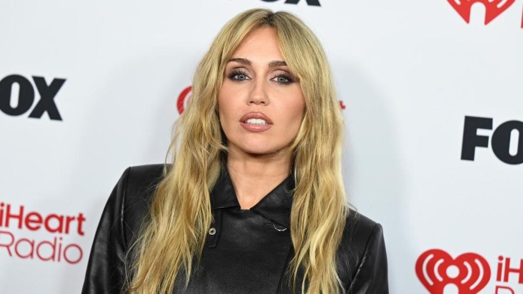 Miley Cyrus' Black Suede Studio Heels Complete Gucci Sequin Gown Look