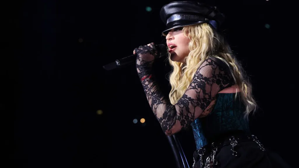 Madonna Shows How It's Done in Plunging Strapless Corset & Miniskirt