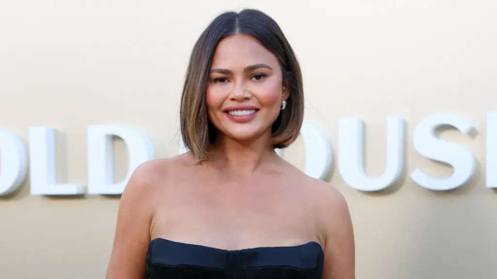 Chrissy Teigen Steals the Spotlight in Strapless Bubble Skirt Dress