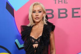 Christina Aguilera Nearly Pops Out of a Sheer Lace Bra Beneath a Wide-Open Top