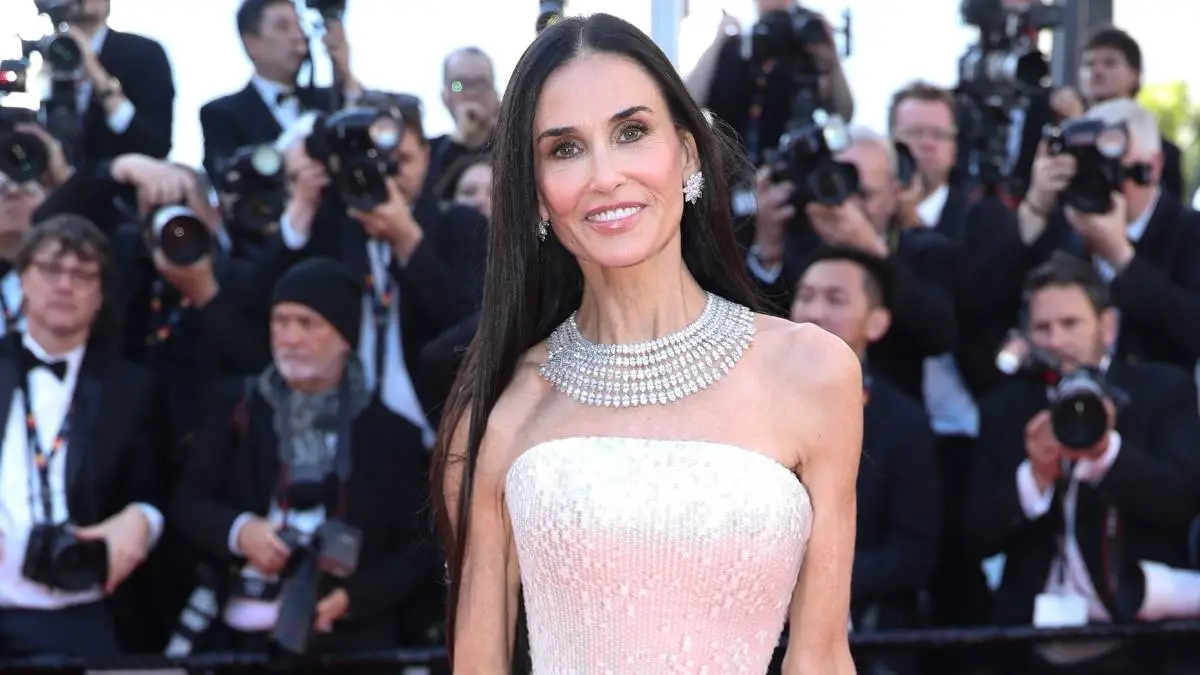 Demi Moore Shines in a Sequinned Off-Shoulder Gown at Cannes - Mandatory