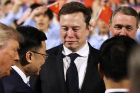 Elon Musk Twirling With His Phone in China Sparks Hilarious Reactions