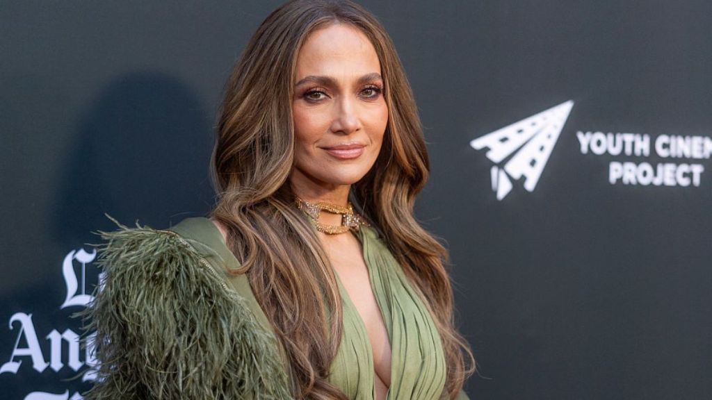 Jennifer Lopez Wears a Plunging Dress With So Many Cut-Outs It’s Barely Holding Together