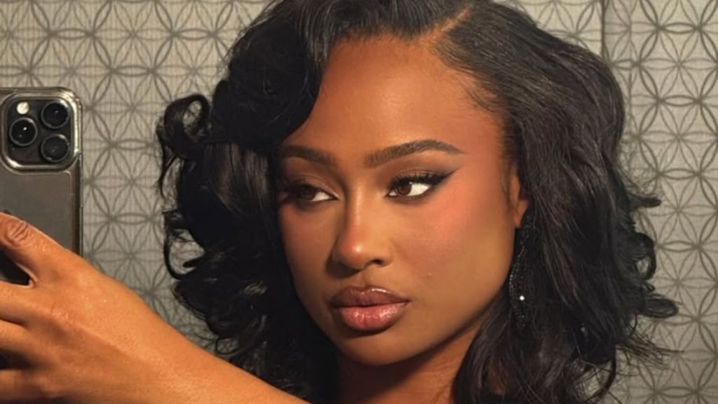 Travis Kelce’s Ex Steps Out in Slit Dress That Puts Her Legs Fully on Display
