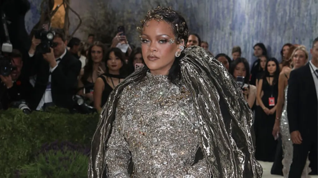 Rihanna's Lacy Lingerie Peeks Through Robe as She Gets Ready for Met Gala