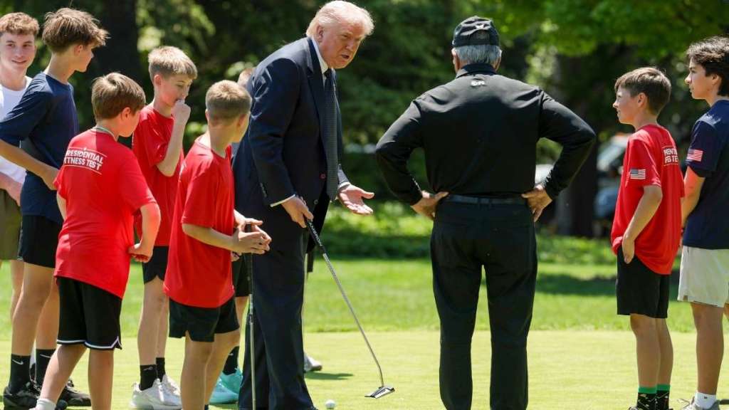 Donald Trump Shows off His Golf Skills To Kids