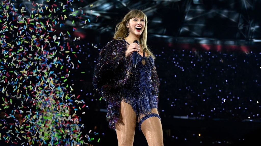 Taylor Swift Pouts in a Plunging Dress During Greece Wedding Trip
