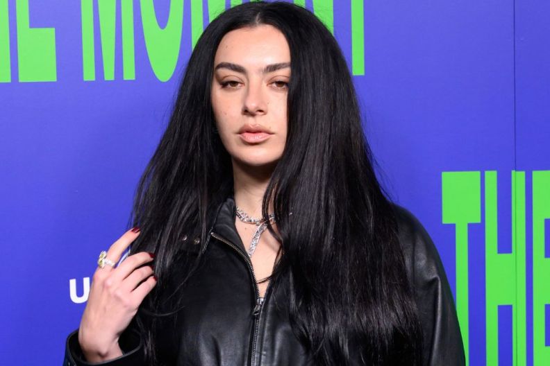 Charli XCX's Jacket Can Barely Contain Her Daring Bra Look