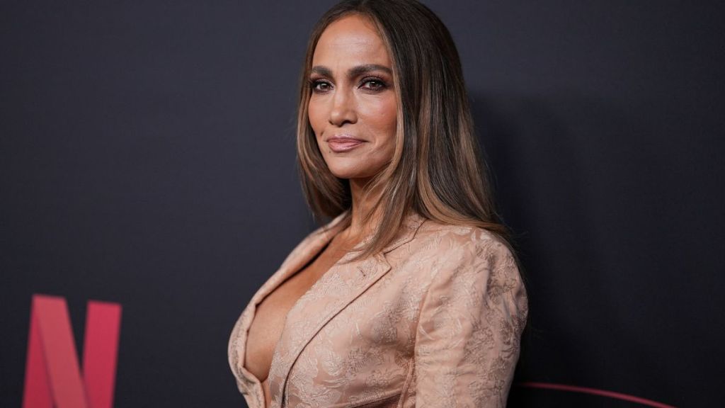 Jennifer Lopez Struggles To Keep Her Sheer Lacy Slip Dress in Place
