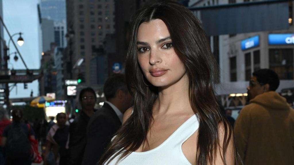 Emily Ratajkowski Shows Major Cleavage in a Dress That Barely Holds Together