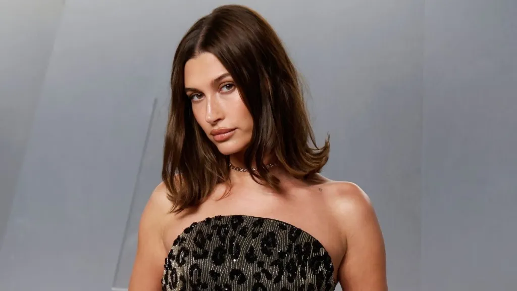 Hailey Bieber Flaunts Serious Curves in Plunging Swimsuit With Cutouts
