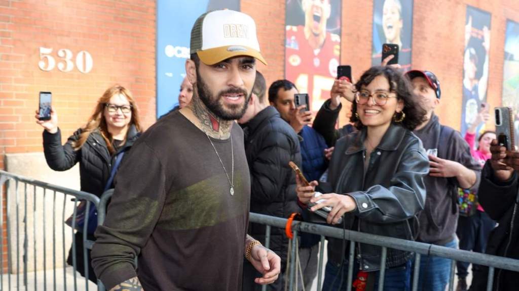 Zayn Malik Dodges Water Bottles at Public Event