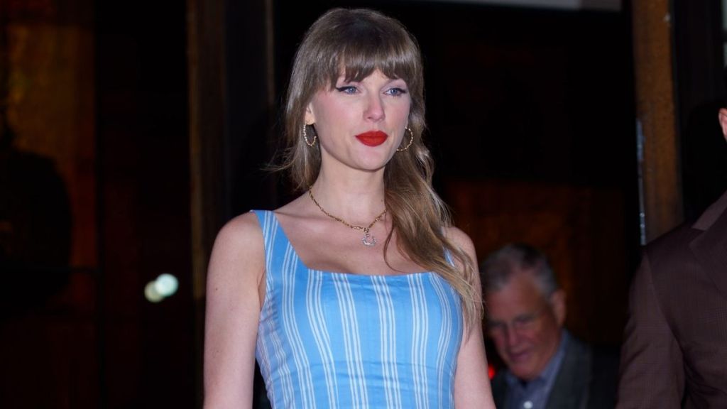 Taylor Swift Flaunts Toned Legs in Strap-Held Micro Minidress