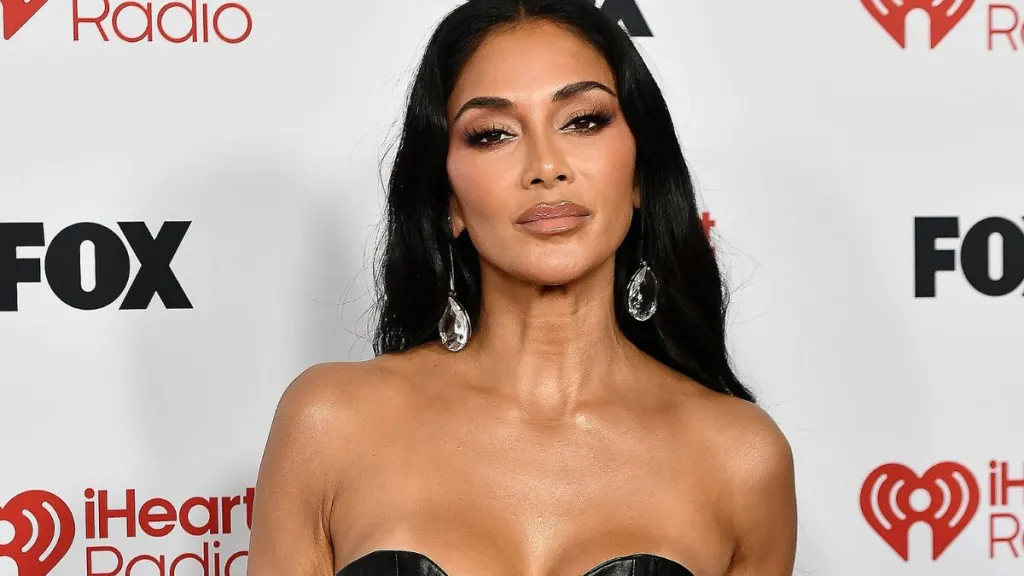 Nicole Scherzinger Shows off Her Curves in Plunging Corset & Latex Pants