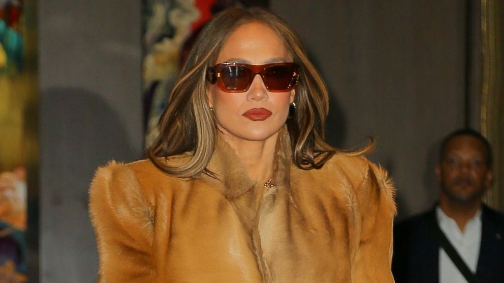 Jennifer Lopez Nails Peekaboo Bra Trend in 2-Button Jacket