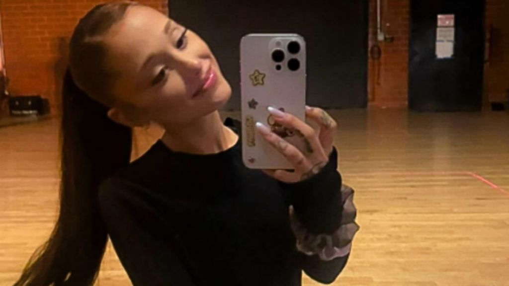 Ariana Grande Performs in Fully See-Through Dress With Abs Peeking Through
