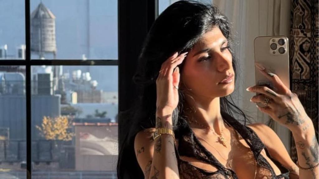 Mia Khalifa’s Curves Almost Spill Out of Her Plunging Corset Top