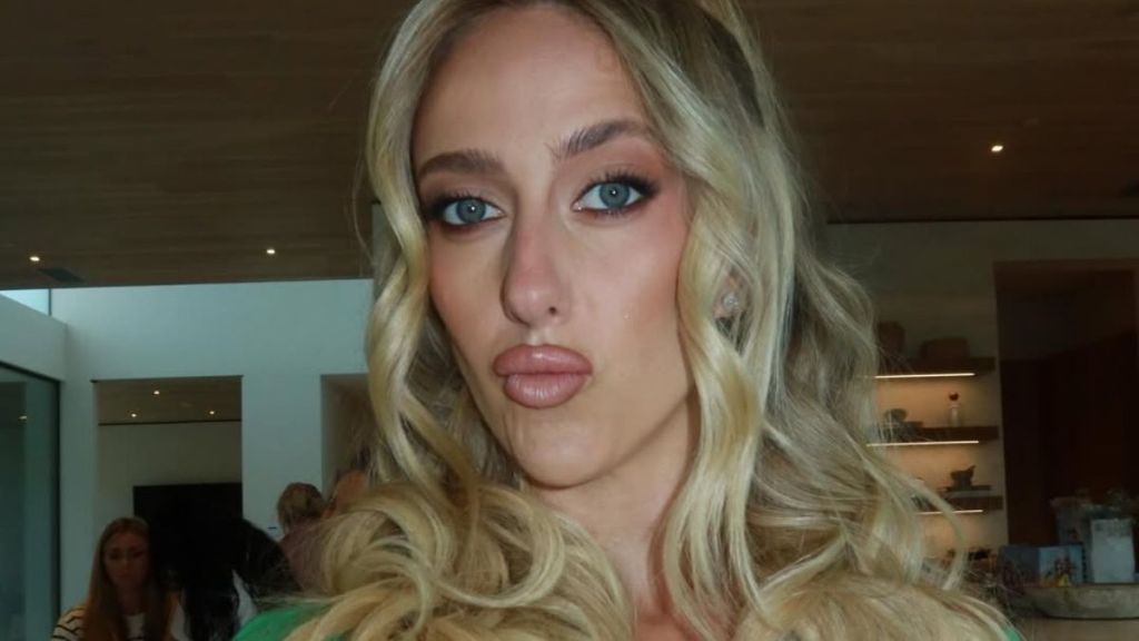 Brittany Mahomes Leaves Micro Minidress Unbuttoned for Deep Plunging Look